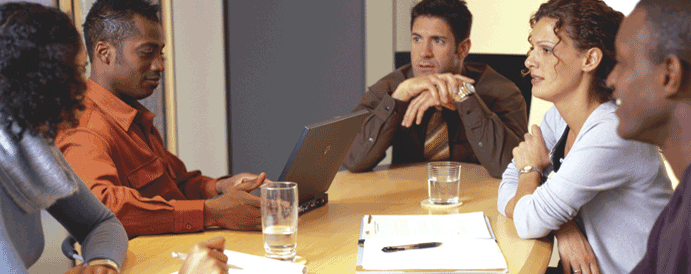 Group of adults at a meeting table