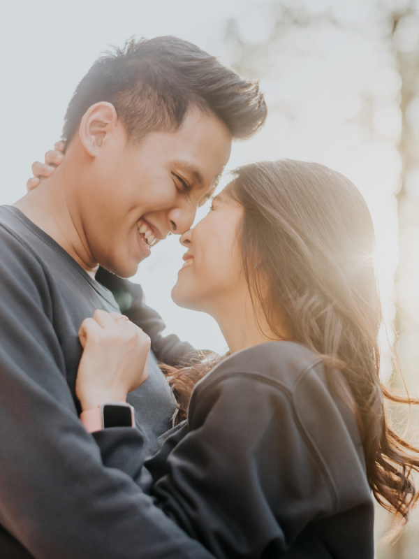 A young couple embraces